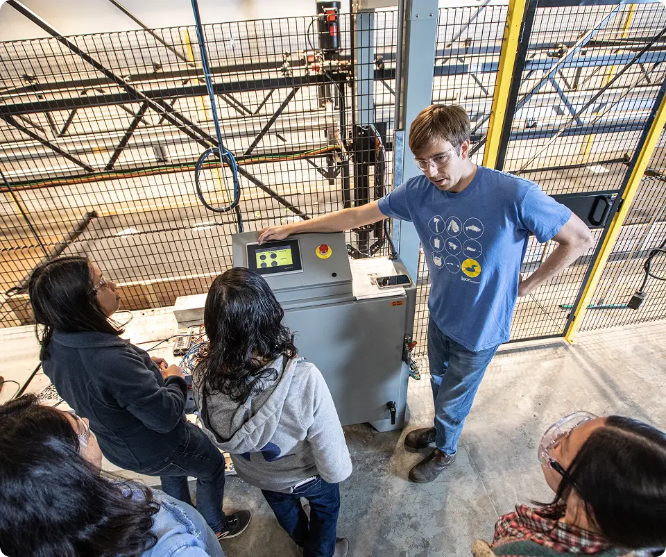 People gathered around a machine